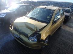 GOLDEN TOYOTA YARIS.JPG