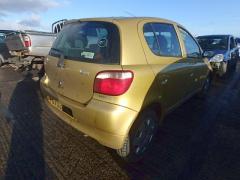 GOLDEN TOYOTA YARIS.3.JPG